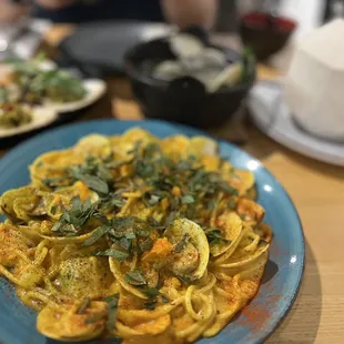 Salted egg pasta (very little pasta noodles once you take off all the clam shells)