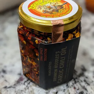 Homemade Thai garlic chili oil. $10.