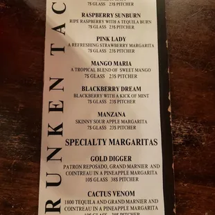 a menu on a wooden table