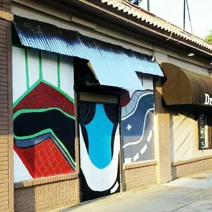 a mural on the side of a building