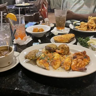 Broiled seafood platter and fried seafood platter