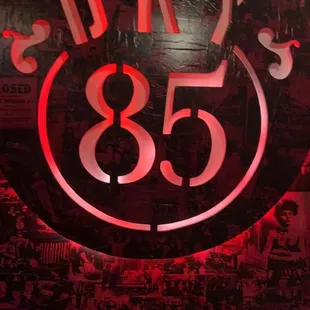 a red neon sign in a bar