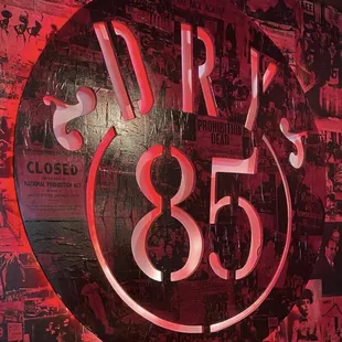 a wall covered in posters