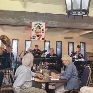 a group of people sitting around a table