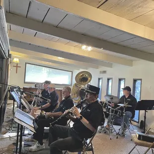 a group of people playing instruments