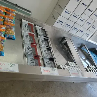 Non-refrigerated display containing dry and canned goods.