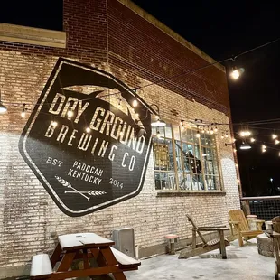 Outside. A bit of snow. Not stopping the folks at Dry Ground from serving great local beers.