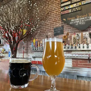 a glass of beer and a mug of beer