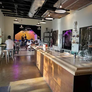 people sitting at the bar