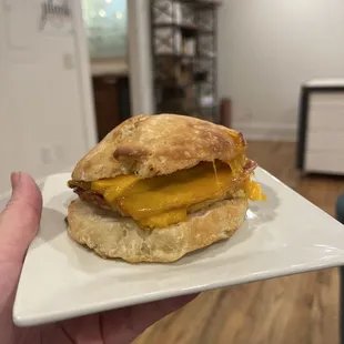 Biscuit with bacon, egg and cheddar cheese