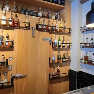 I love this whiskey wall