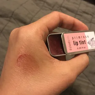Primrose lip tint with a smear on hand for color reference