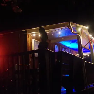 View of the club at night from the parking lot.