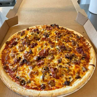 a pizza in a pizza box