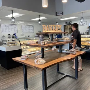 a woman standing in front of the counter