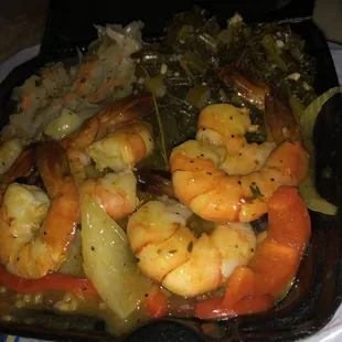 Medium Curry Shrimp Plate w/ rice and beans, Collard Greens, and Steamed Cabbage.