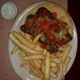 Gyro with fries tzatziki sauce so good salad next picture.