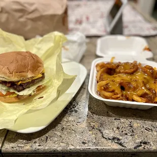 Western Cheeseburger and side of Curly Chili Cheese Fries