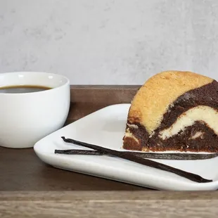 a slice of cake and a cup of coffee