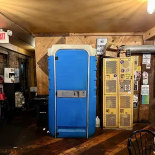 Bathroom at DT Kirby&apos;s. Looks like a porta-potty but opens into an actual bathroom. LOL!