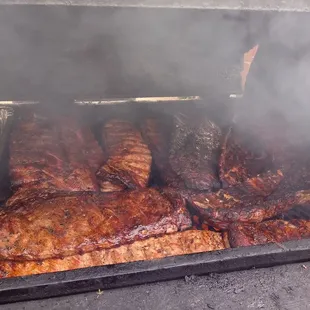smoke coming out of the grill