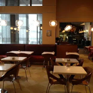 tables and chairs in a restaurant