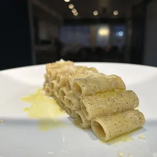 a pasta dish on a white plate