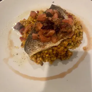 Orata over couscous with Mediterranean salsa