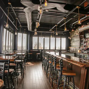 a view of a bar with a ceiling fan
