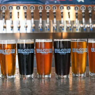 a row of beer glasses