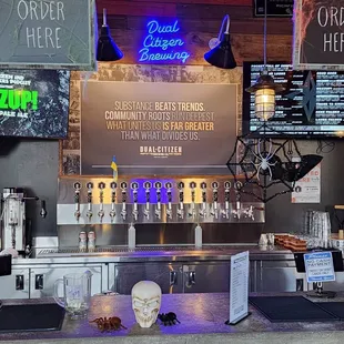 a bar with a skull head on the counter