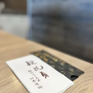a business card on a table