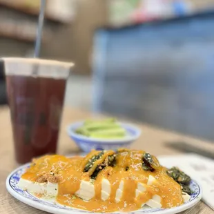 a plate of food and a drink