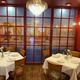 a dining room with a chandelier