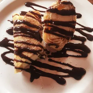 a dessert with chocolate drizzle