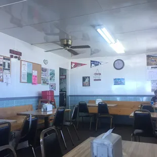 a restaurant with tables and chairs