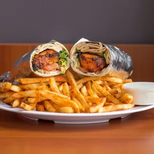 House seasoned fries with our chicken kabob wrap is the perfect combo...don&apos;t forget to sauce it up!