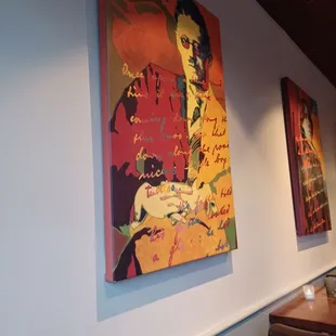 a painting of a man holding a guitar