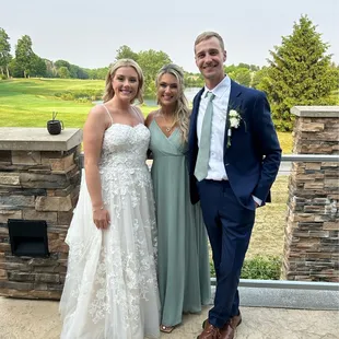 Bride, Groom and friend