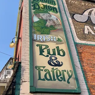 a sign on the side of a building