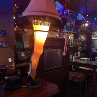 the interior of a pub with a lamp