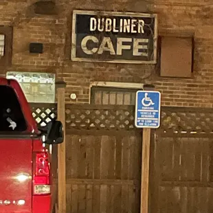 a red truck parked in front of it