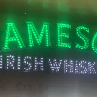 a neon sign for jameson irish