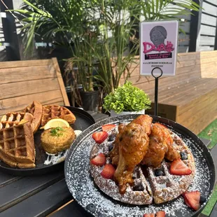 Chicken and waffles and crab cake and cornbread with Tartar sauce