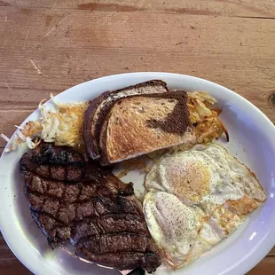 Steak, eggs and hash browns w/rye toast.