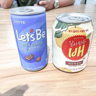 Cute cans of coffee and pear flavored drink