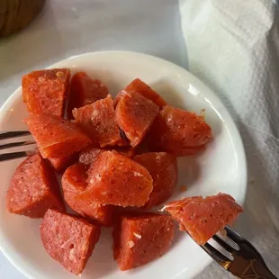 Nem chua cube wrapped in banana leaves