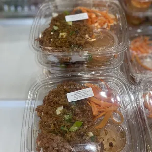 a variety of food in plastic containers