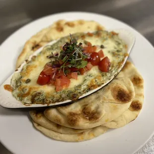 Are you a chiefs or bucs fan? We have an appetizer that everybody will love! Our spinach and artichoke dip. Available for take-out too!