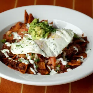 Did someone say Chilaquiles? Yep, We got them, and they are delicious.